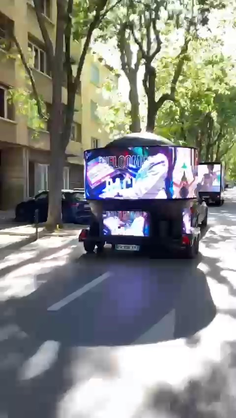 Mirage Ball with 360° LED screen driving through a city street